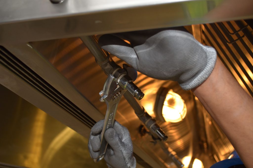 Professional handy fix holdings plumbing fixing a leaking tap